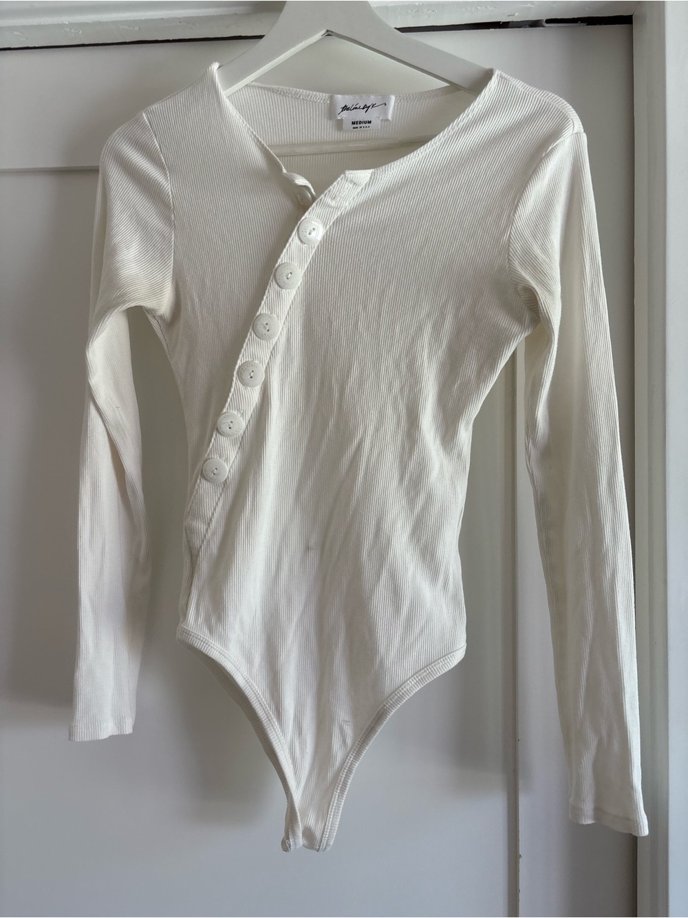 The Line by K Cream Ribbed Long-Sleeve Snap-Front Bodysuit